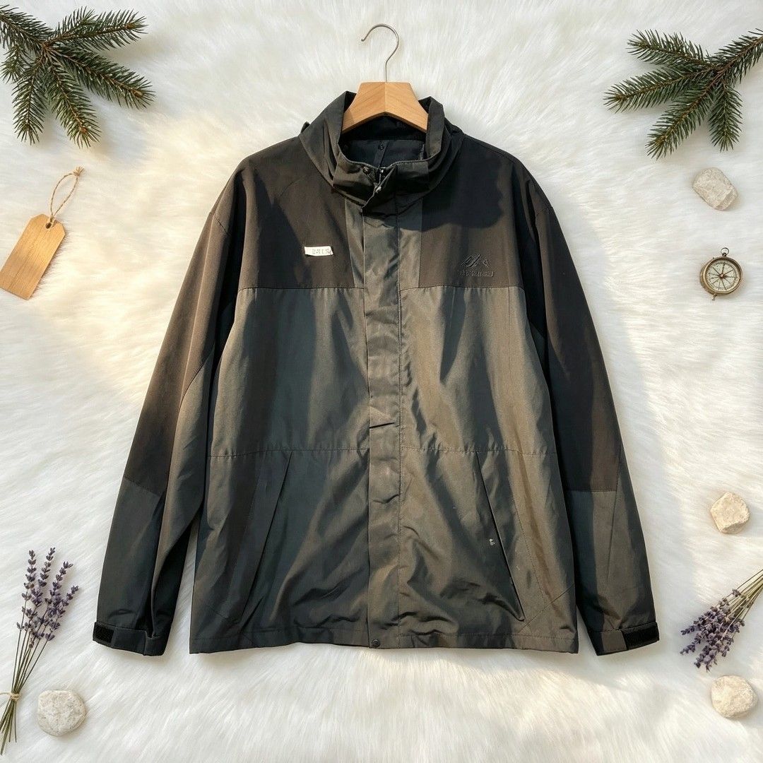 Outdoor Adventure Jacket - Black & Grey (Category: Coats, Jackets and Outerwear) located in Manila. Submitted by momofunodos (Listing ID 1460961973, Image 1). Description: - Stylish black and grey two-tone outdoor jacket. - Features a modern stand-up collar. - Convenient front pockets for your essentials. - Adjustable velcro cuffs for a custom fit. - Subtle mountain logo detail on the chest. - Ideal for hiking adventures or everyday casual wear..