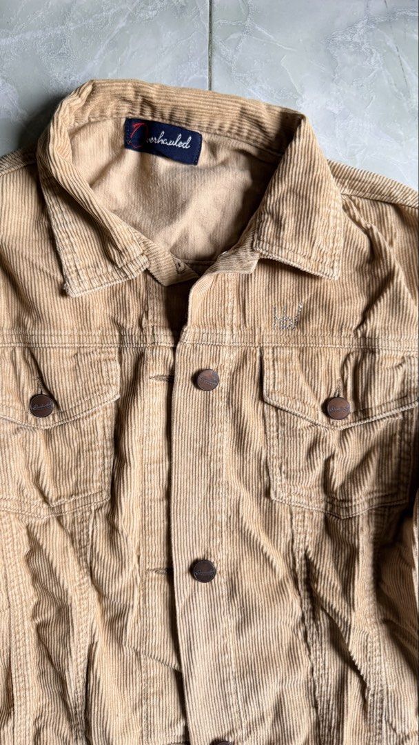 Overhauled Corduroy Button-Up Jacket Tan (Category: Coats, Jackets and Outerwear) located in General Santos City (Dadiangas). Submitted by ssssshhhhhhhhh (Listing ID 1460950463, Image 2). Description: - Tan corduroy jacket - Brand: Overhauled - Classic button-up style - Two chest pockets - Trucker jacket fit - Ideal for layering - Great for casual wear.