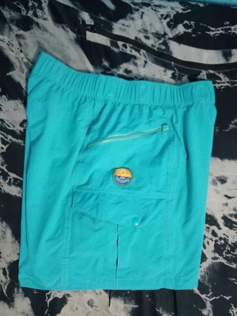 Patagonia Turquoise Cargo Shorts Size S (Category: Shorts) located in Manila. Submitted by solisjethr46316 (Listing ID 1461066967, Image 3). Description: - Patagonia Cargo Shorts - Color: Turquoise - Size: S - Elastic waistband with drawstring - Two front zip pockets - One back button pocket - Small Patagonia logo patch on front and back - Made in Vietnam.
