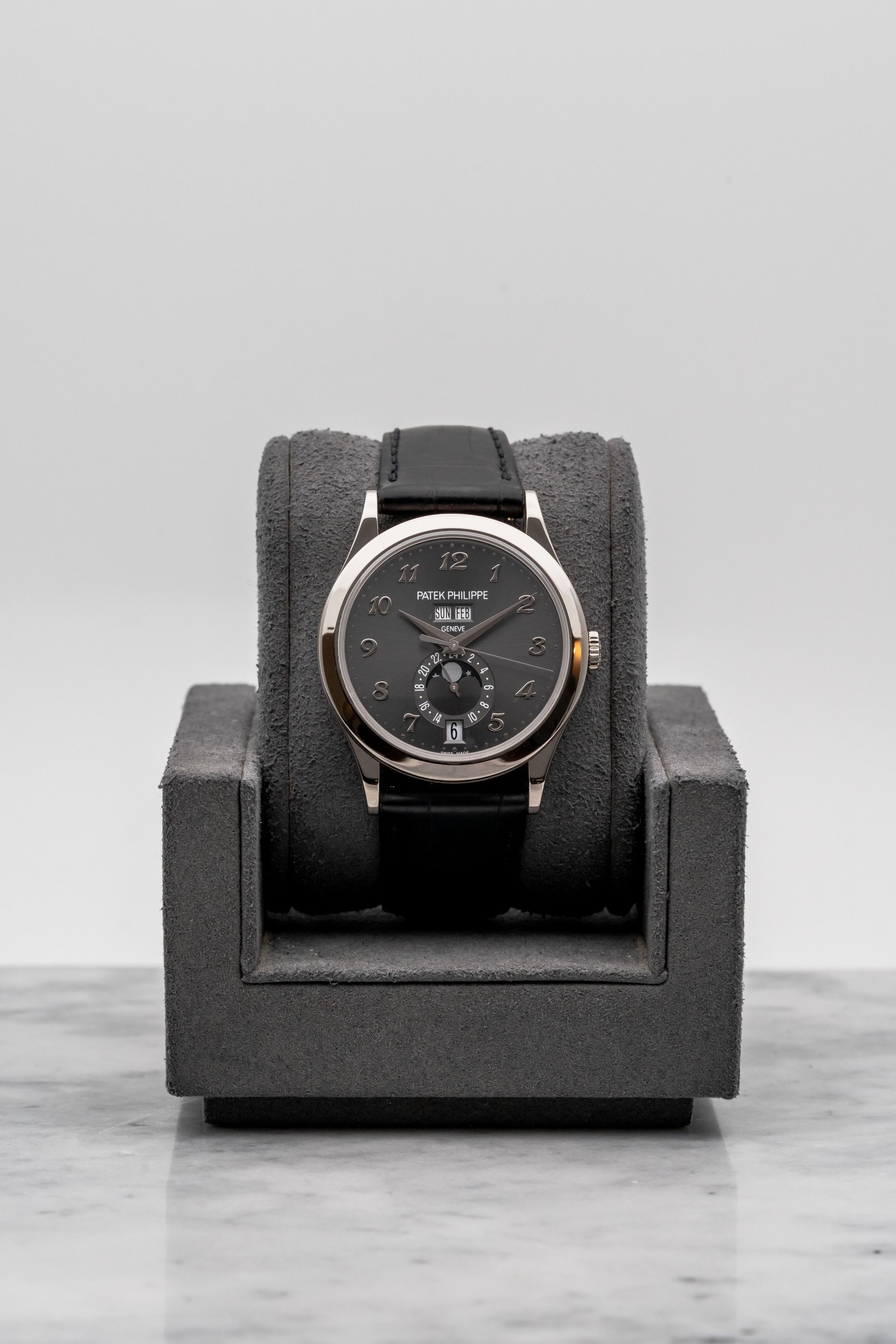 Patek Philippe Annual Calendar 5396G-014 Grey Arabic Dial • 2018 • 📦 & 📄 (Category: Watches) located in Singapore. Submitted by timetells (Listing ID 1460931174, Image 1). Description: Brand: Patek Philippe Model: Annual Calendar Reference Number: 5396G-014 Year: 2018 Case Size: 38.5 mm Case Material: 18K White Gold Dial: Anthracite Grey Dial with Applied White Gold Breguet-Style Arabic Numerals, Day and Month Apertures, Date Display at 6 o'clo