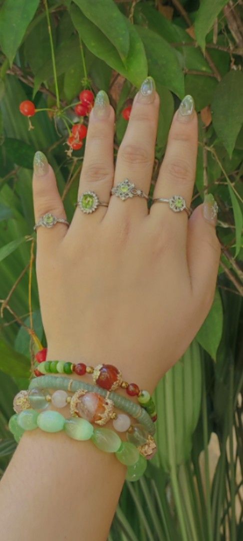 Peridot Gemstone Silver Plated Adjustable Ring (Category: Bracelets) located in Kinoguitan. Submitted by artemiscrystal (Listing ID 1460970071, Image 3). Description: -Peridot rings Silver plated adjustable size. -Price: 120-250 😱 1. 3 stones : 250 2. Big stone : 220 3. Eye : 120 4/5.flower: 120 -Mineral Properties: Gem quality variety of the mineral olivine,known for its distinct lime to olive green color. -Metaphysical Properties: Emotional de