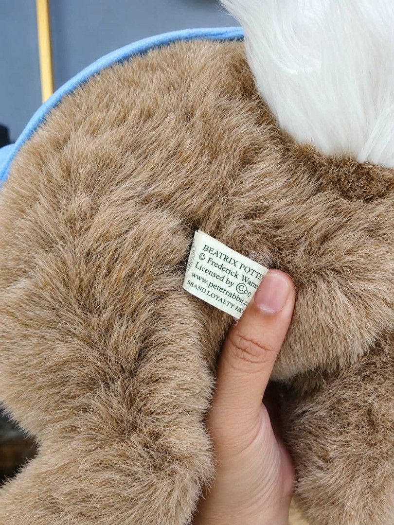 Peter Rabbit Plush Toy Blue Jacket Vintage (Category: Plushies & Soft Toys) located in Subic. Submitted by ichellesingque5 (Listing ID 1461080035, Image 3). Description: - Vintage - Adorable Peter Rabbit plush toy - Features his iconic blue jacket with silver buttons - Soft and cuddly material - Ideal for display or playtime - Perfect gift for fans of the classic character.