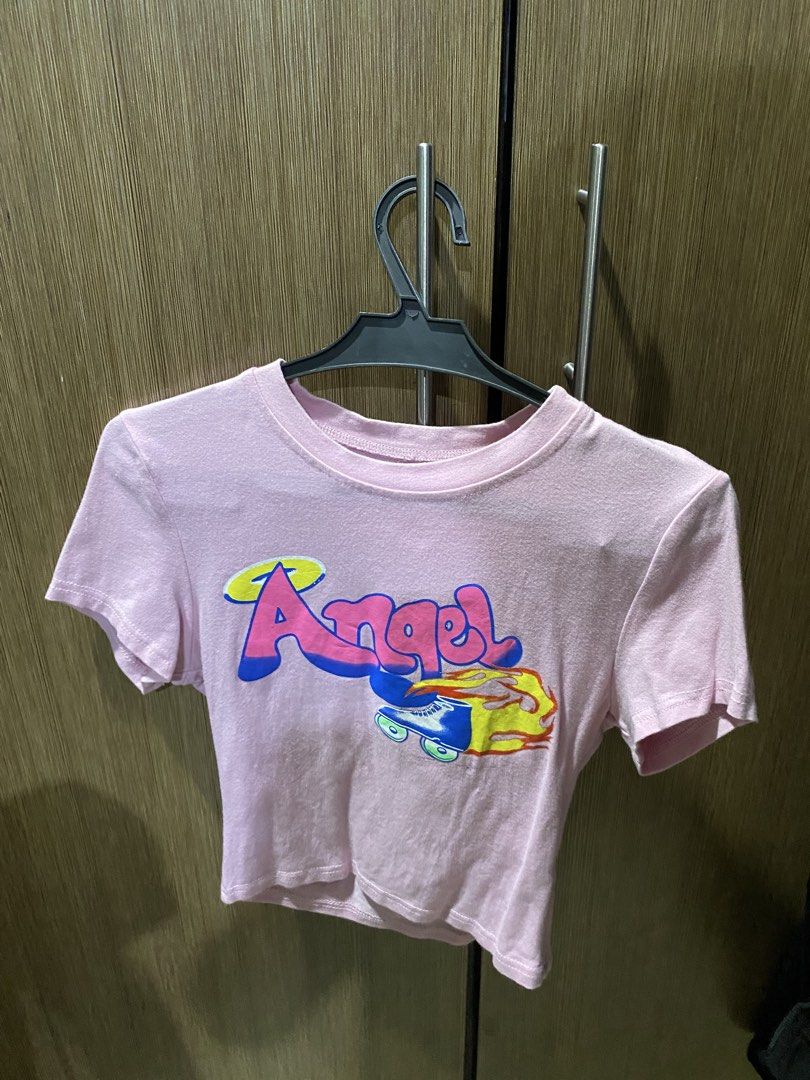 Pink Angel Graphic Crop Top (Category: Shirts) located in Manila. Submitted by arimagrae (Listing ID 1461022384, Image 1). Description: - pink crop top - fits xs-s - decluttering mop: gcash/maribank mod: jnt/lalamove.