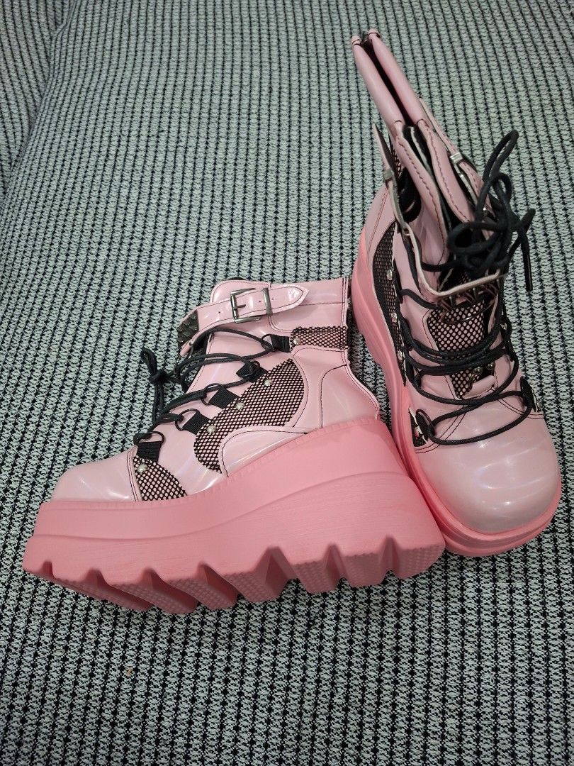 Pink Chunky Platform Boots with Mesh Detail (Category: Boots) located in Cavite. Submitted by hermione.2000 (Listing ID 1461083841, Image 2). Description: - Super cute pink platform boots - Shiny patent finish with black mesh panels - Lace-up front closure - Side buckle and zip for easy on/off - Thick, chunky sole for extra height - Perfect for a bold, statement outfit.