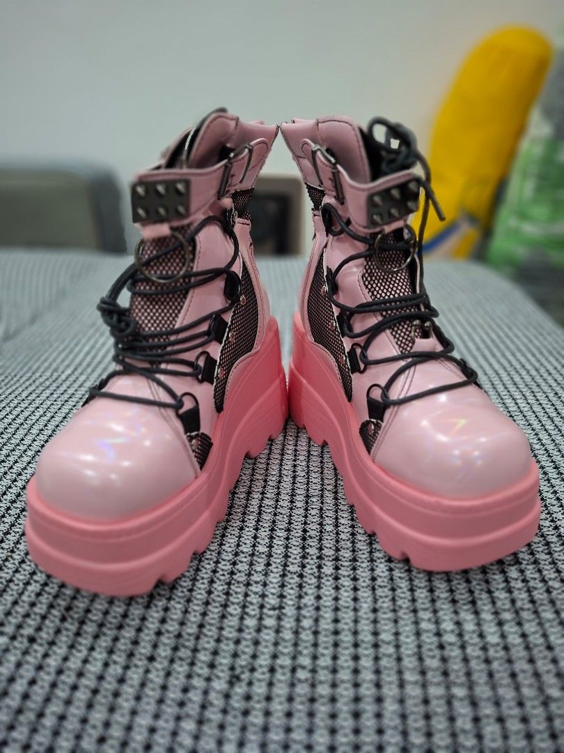 Pink Chunky Platform Boots with Mesh Detail (Category: Boots) located in Cavite. Submitted by hermione.2000 (Listing ID 1461083841, Image 1). Description: - Super cute pink platform boots - Shiny patent finish with black mesh panels - Lace-up front closure - Side buckle and zip for easy on/off - Thick, chunky sole for extra height - Perfect for a bold, statement outfit.