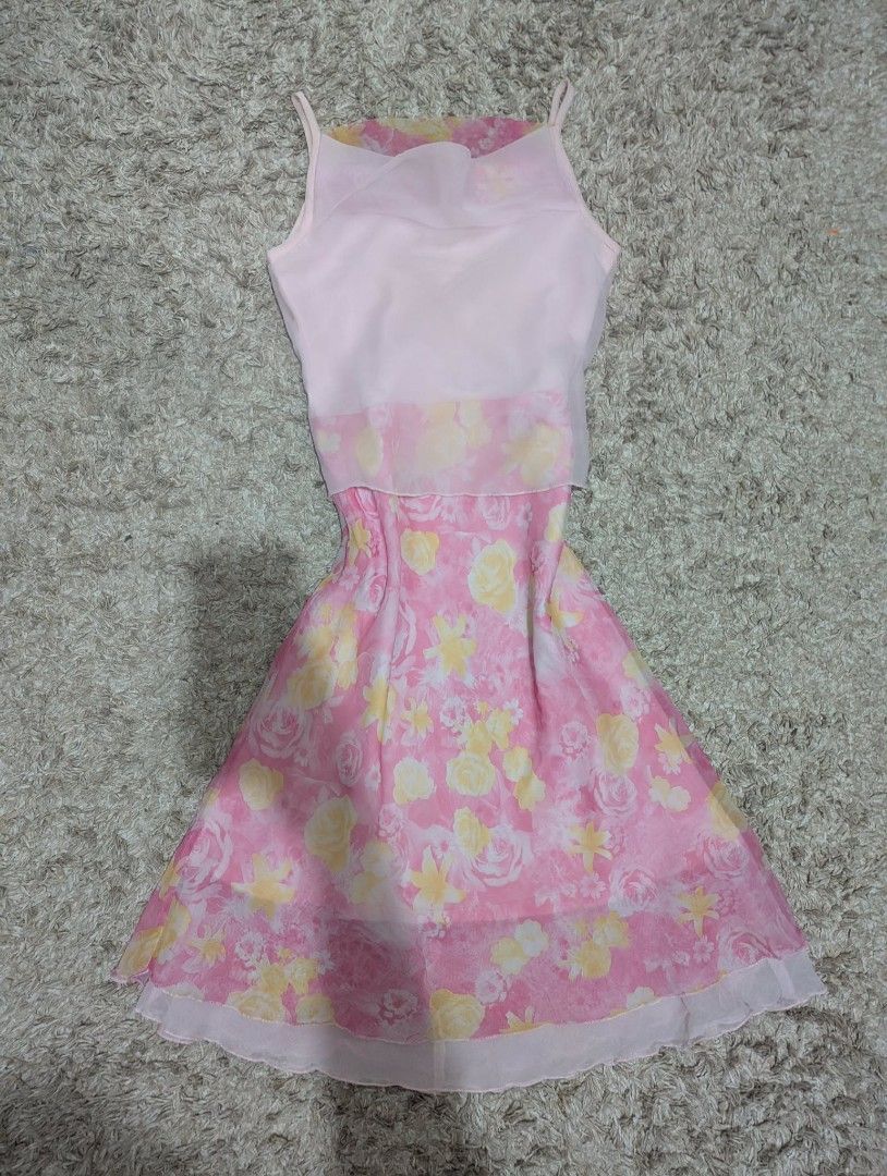 Pink Floral Spaghetti Strap Dress (Category: Dresses) located in Manila. Submitted by drei_thrift (Listing ID 1460964951, Image 1). Description: - Adorable pink dress with a charming floral print. - Features a light pink camisole top layered over a flowy skirt. - Delicate spaghetti straps. - Gathered waist for a flattering fit. - Ideal for casual days or beach adventures. - Made from lightweight, breathable fabric..