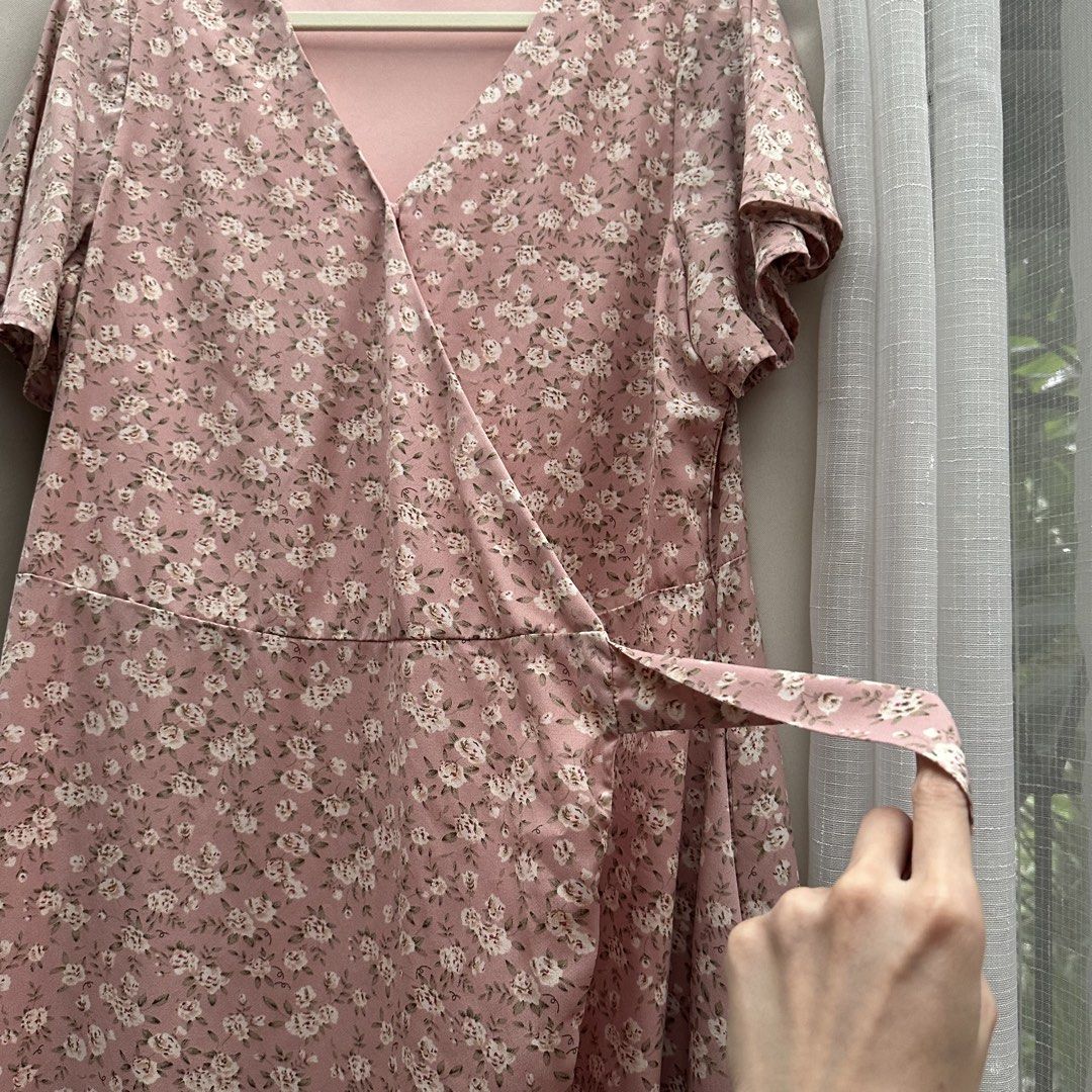 Pink Floral Wraparound Dress (Category: Dresses) located in Cainta. Submitted by tooonico (Listing ID 1461023549, Image 2). Description: Quality fabric! RFS: Decluttering MOP: GCash/Maya/Maribank/UB .