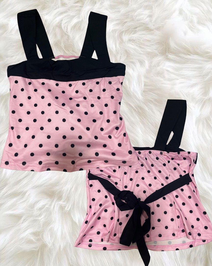Pink Polka Dot with Black Accents (Category: Undergarments & Loungewear) located in Manila. Submitted by love_by_sash (Listing ID 1461077300, Image 1). Description: - Adorable pink pajama set with classic black polka dots. - Includes a comfortable cami top with black straps. - Matching shorts feature a chic black ribbon tie at the waist. - Perfect for lounging, relaxing at home, or sleepovers. - Soft and stylish for ultimate comfort..