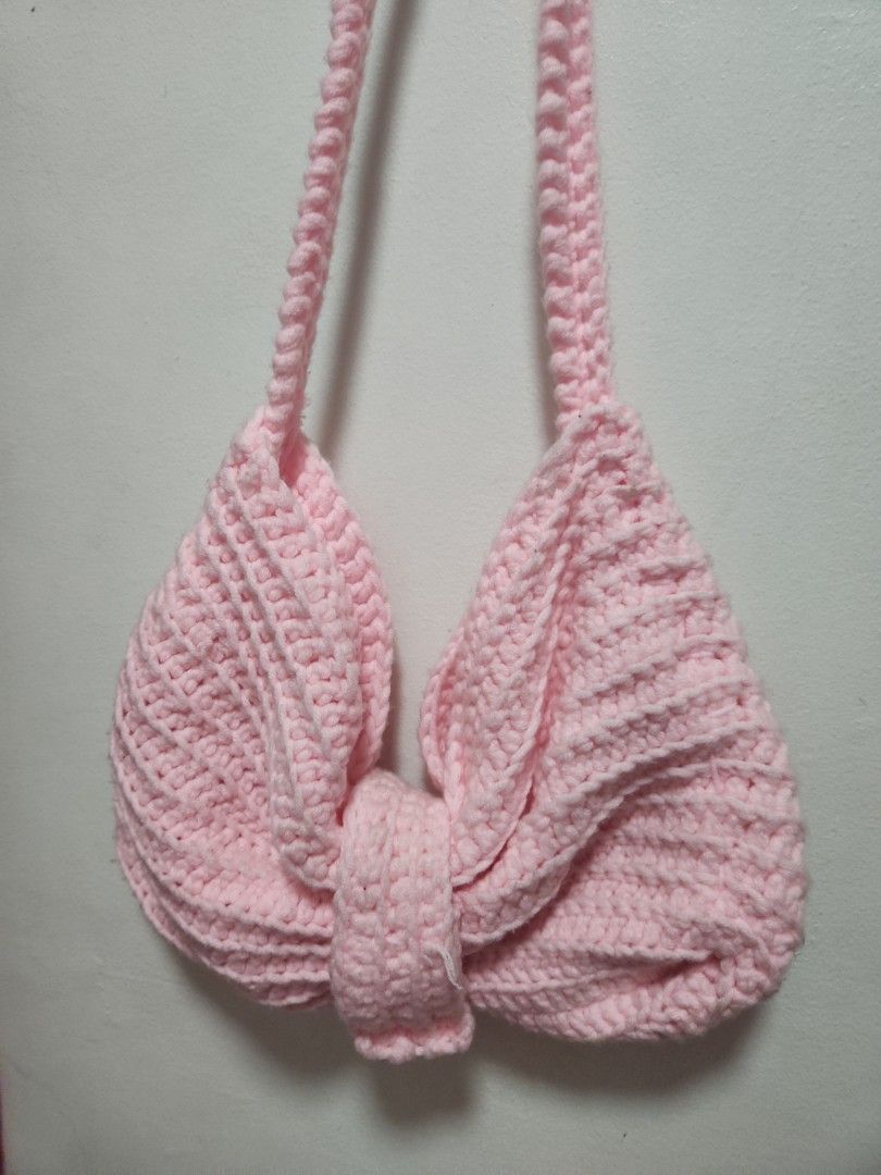 Pink Ribbon Crochet Bag (Category: Shoulder Bags) located in Caloocan City. Submitted by woainidoll (Listing ID 1461024655, Image 1). Description: - Adorable pink ribbon crocheted bag - Comfortable crocheted straps - Ideal for carrying your small essentials - Handmade with a unique design.