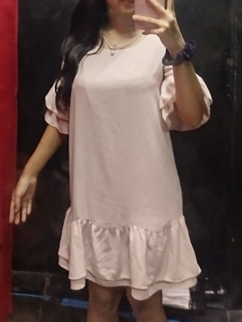 Pink Ruffle Sleeve Mini Dress (Category: Dresses) located in Quezon City. Submitted by cuteitemsonlyyy (Listing ID 1461046307, Image 2). Description: - Small to Medium - Adorable pink korean mini dress - Features charming ruffle sleeves - Ruffle detail on the hem - Simple and sweet design - Versatile for casual outings or parties - Comfortable and flattering fit.