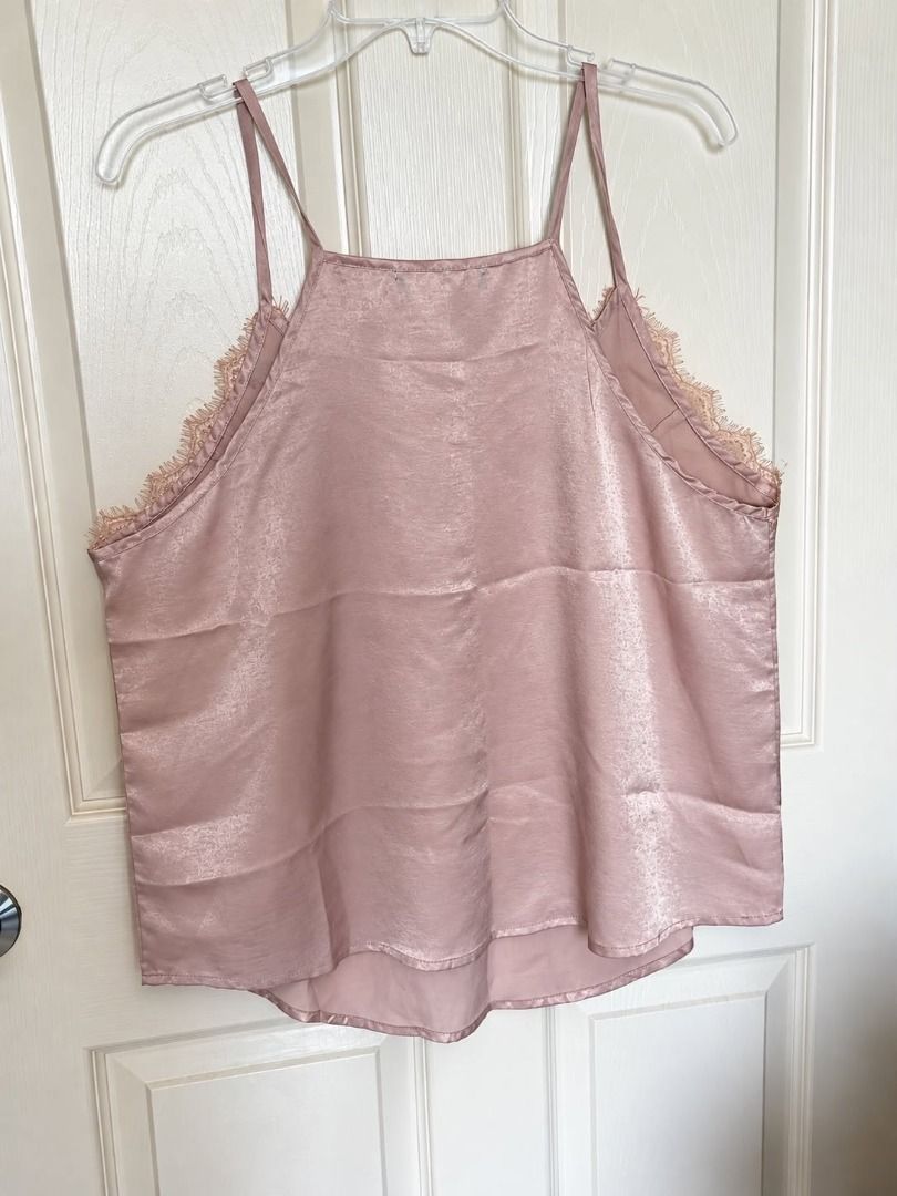 Pink Satin Lace Trim Cami Top (Category: Sleeveless) located in Cebu City. Submitted by classy82 (Listing ID 1460927293, Image 2). Description: - Soft pink satin camisole - Delicate lace trim along neckline - Adjustable spaghetti straps - Smooth, shiny fabric - Versatile: great for layering or wearing on its own.