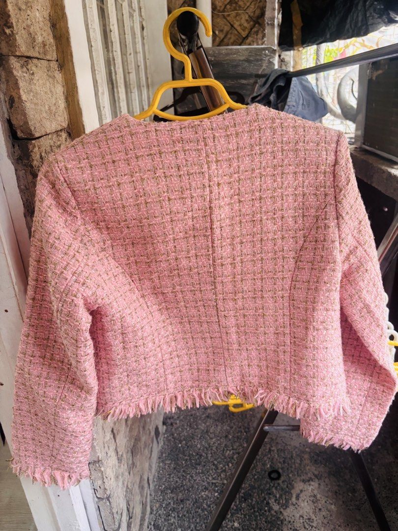 Pink Tweed Jacket with Gold Thread and Fringed Hem (Category: Coats, Jackets and Outerwear) located in Manila. Submitted by yanastash (Listing ID 1461027781, Image 2). Description: 🩷 Pink & Gold Tweed Jacket 🩷 ✨ Condition: Preloved ⚠️ Issue: Please see photos for the actual condition/details. 🎀 Details: • Cute pink tweed jacket • Woven with shimmering gold threads ✨ • Stylish fringed hem and cuffs • Two front button closures • Perfect for dres