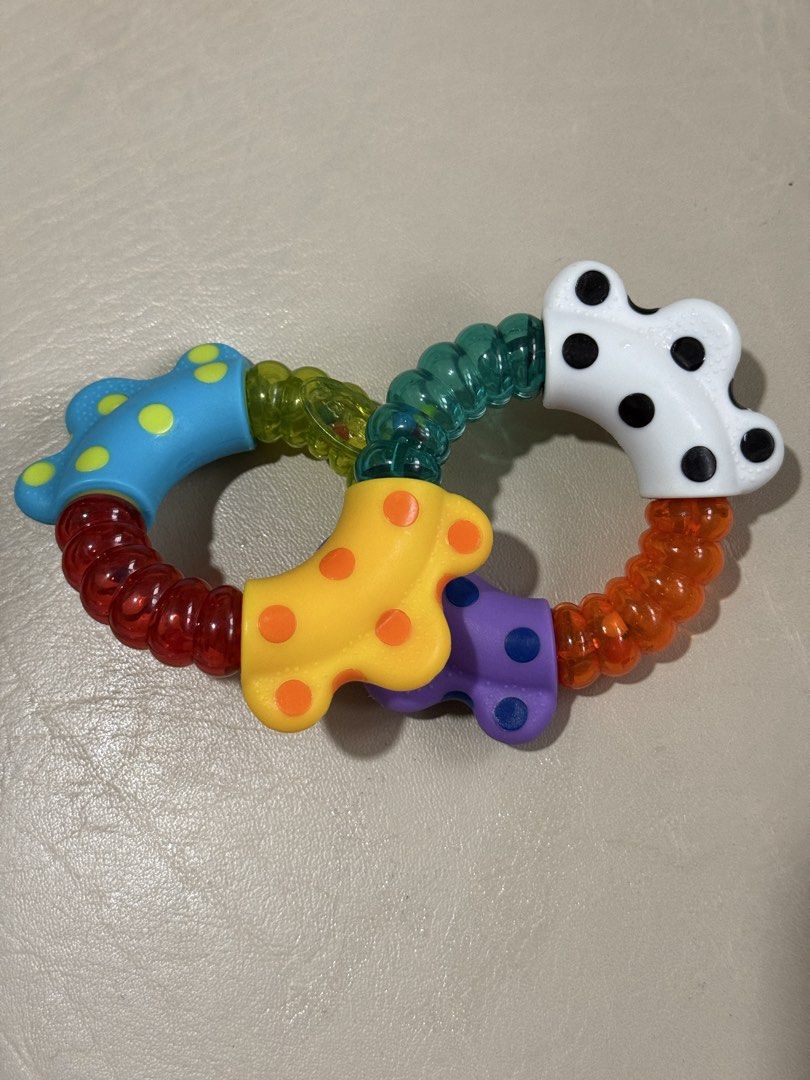 Playgro Click and Twist Rattle (Category: Infant Playtime) located in Angeles City. Submitted by holyfabclothing (Listing ID 1460938808, Image 3). Description: Playgro Click and Twist Rattle a colorful baby sensory and teething toy featuring bendable, twisting segments with textured surfaces..