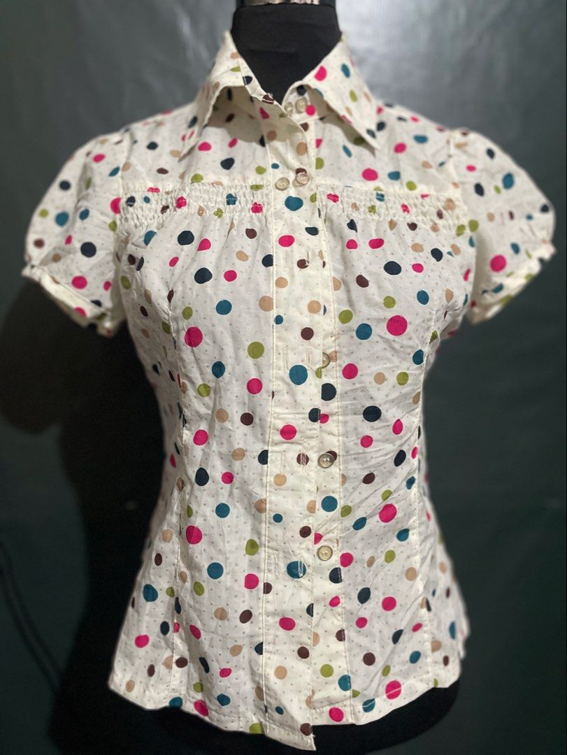 Polka dot polo blouse (Category: Blouses) located in Roxas City. Submitted by budgetfindsroxasph (Listing ID 1461086814, Image 1). Description: Minor flaw : 1 button replaced .
