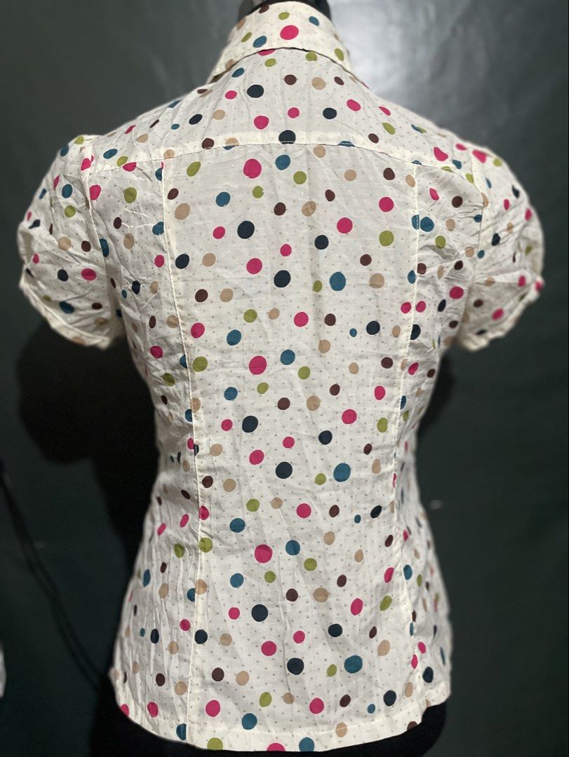 Polka dot polo blouse (Category: Blouses) located in Roxas City. Submitted by budgetfindsroxasph (Listing ID 1461086814, Image 2). Description: Minor flaw : 1 button replaced .