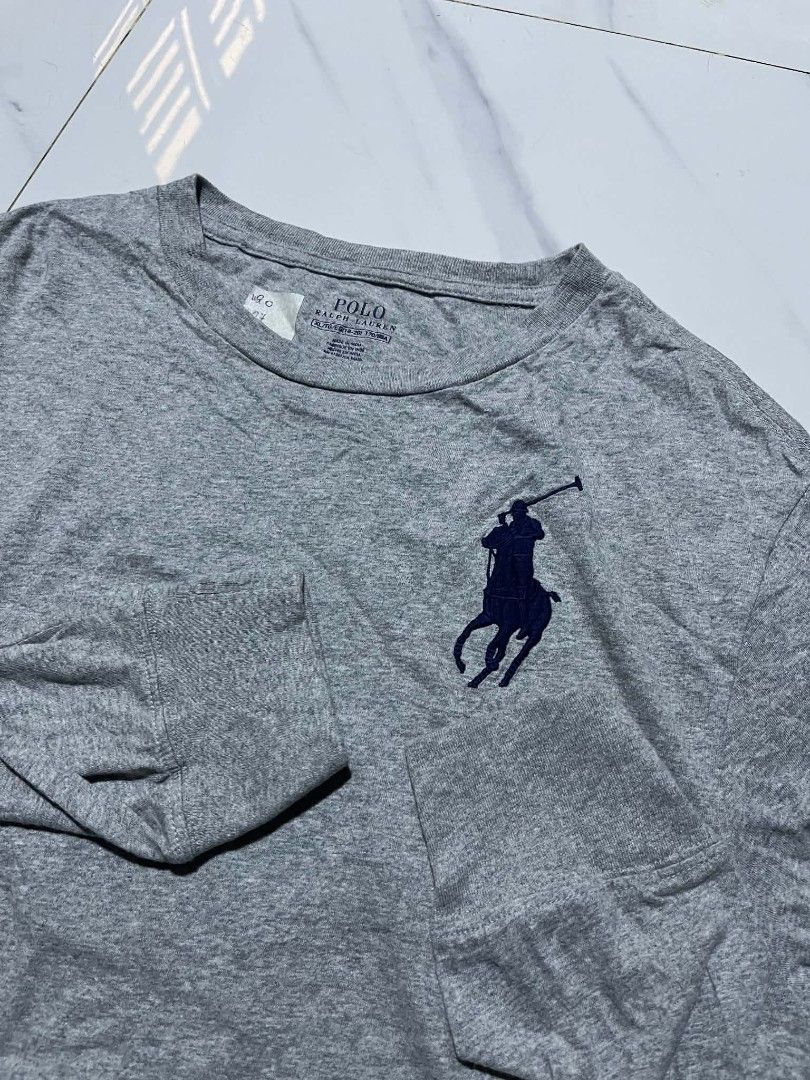 Polo Ralph Lauren Grey Long Sleeve (Category: Tshirts & Polo Shirts ) located in Pangantucan. Submitted by calmwhale_cb83a8 (Listing ID 1461002149, Image 2). Description: - Brand: Polo Ralph Lauren - Color: Grey -best fit large,slim fit to xl - Style: Long sleeve t-shirt - Features: Classic polo player logo on chest, large '3' graphic on back - Material: Soft cotton - Occasion: Casual wear.