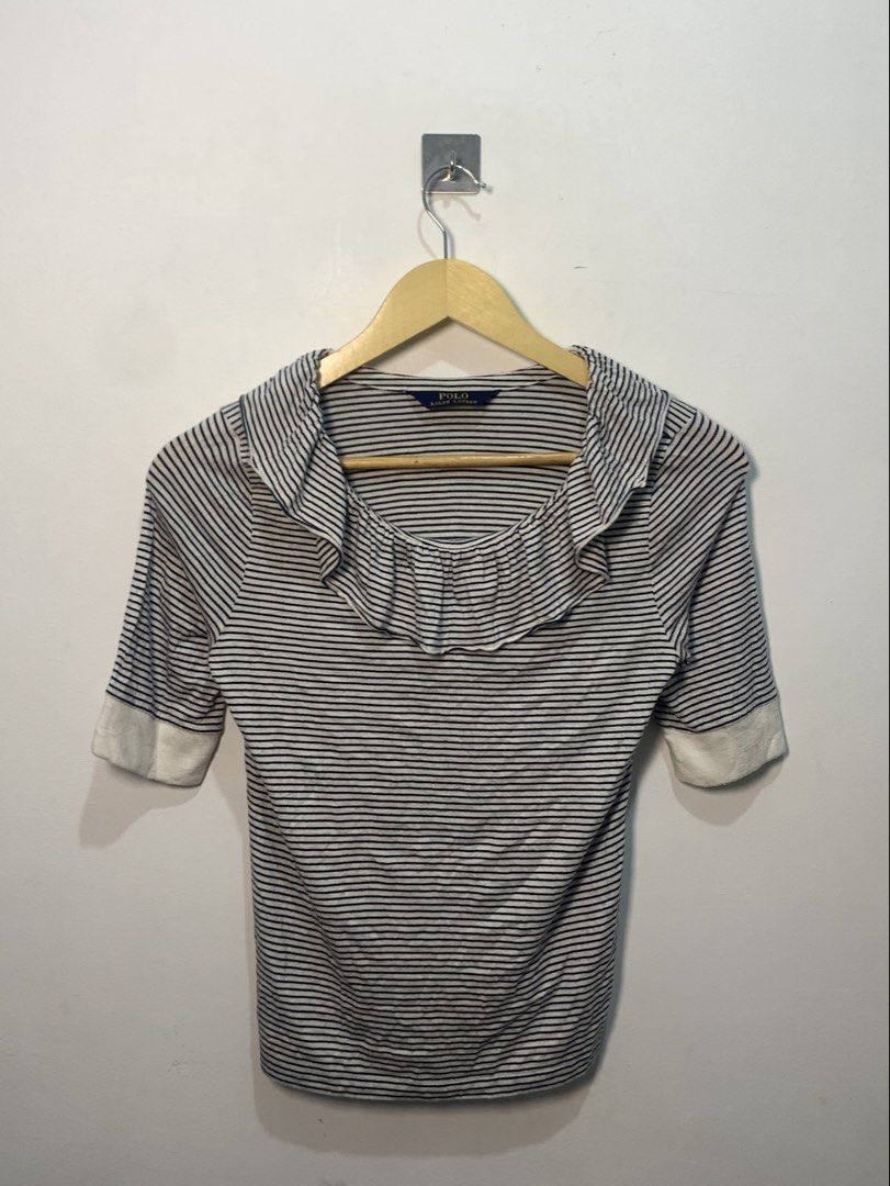 Polo Ralph Lauren Striped Ruffle Top (Category: Blouses) located in Davao. Submitted by legitseller1111 (Listing ID 1461053330, Image 1). Description: - Polo Ralph Lauren top - Navy and white stripes - Cute ruffle detail around the neckline - Short sleeves with white cuffs - Soft modal blend fabric - Versatile for casual or dressed-up occasions -Like new condition -No issue .
