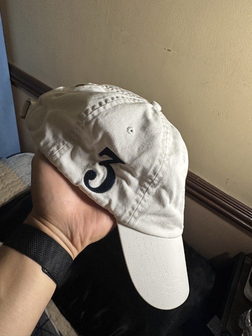 Polo Ralph Lauren White Baseball Cap (Category: Caps & Hats) located in Caloocan City. Submitted by jhk2922 (Listing ID 1460996487, Image 2). Description: - Classic white Polo Ralph Lauren baseball cap - Features the iconic polo player logo on the front - 'POLO' embroidered on the back - '3' embroidered on the side - Adjustable strap for a comfortable fit - One size fits most.