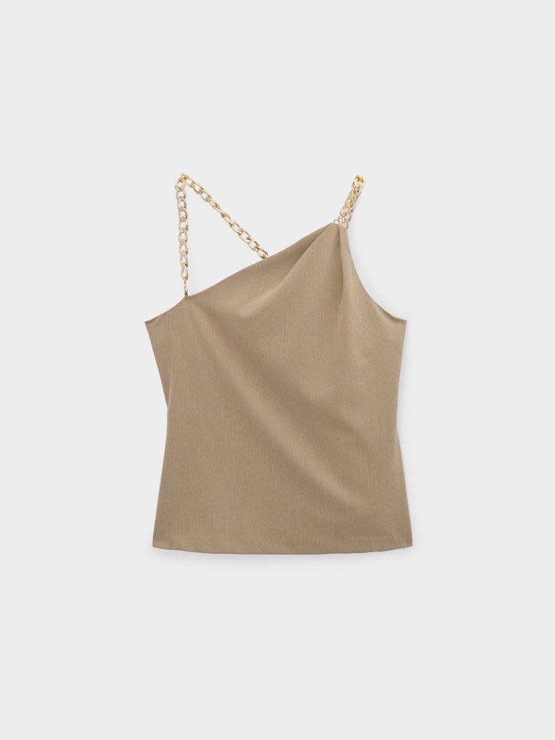 Pomelo Gold-Chain Strap Asymmetrical Top in Brown (Category: Sleeveless) located in Tarlac. Submitted by samdeclutters_ (Listing ID 1461008309, Image 1). Description: - Size: XS - Material: Polyester / Spandex - Features: Gold chain strap, invisible back zip - Used once.