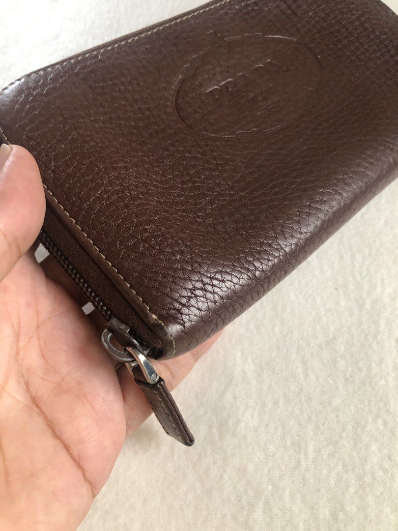 Prada choco brown zip long wallet (Category: Luxury Bags & Wallets) located in Pasig City. Submitted by maricrism68145 (Listing ID 1461055733, Image 3). Description: Japan preloved.
