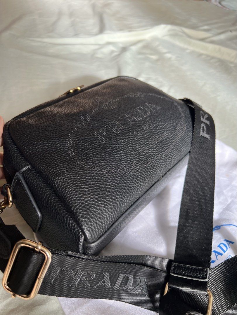 Prada Double Zip Camera Bag (Category: Cross-body Bags) located in Imus. Submitted by vdc.apparel (Listing ID 1460923361, Image 2). Description: Black textured leather Prada Double Zip Camera Bag crafted in Vitello Daino or Phenix leather with gold-tone hardware..