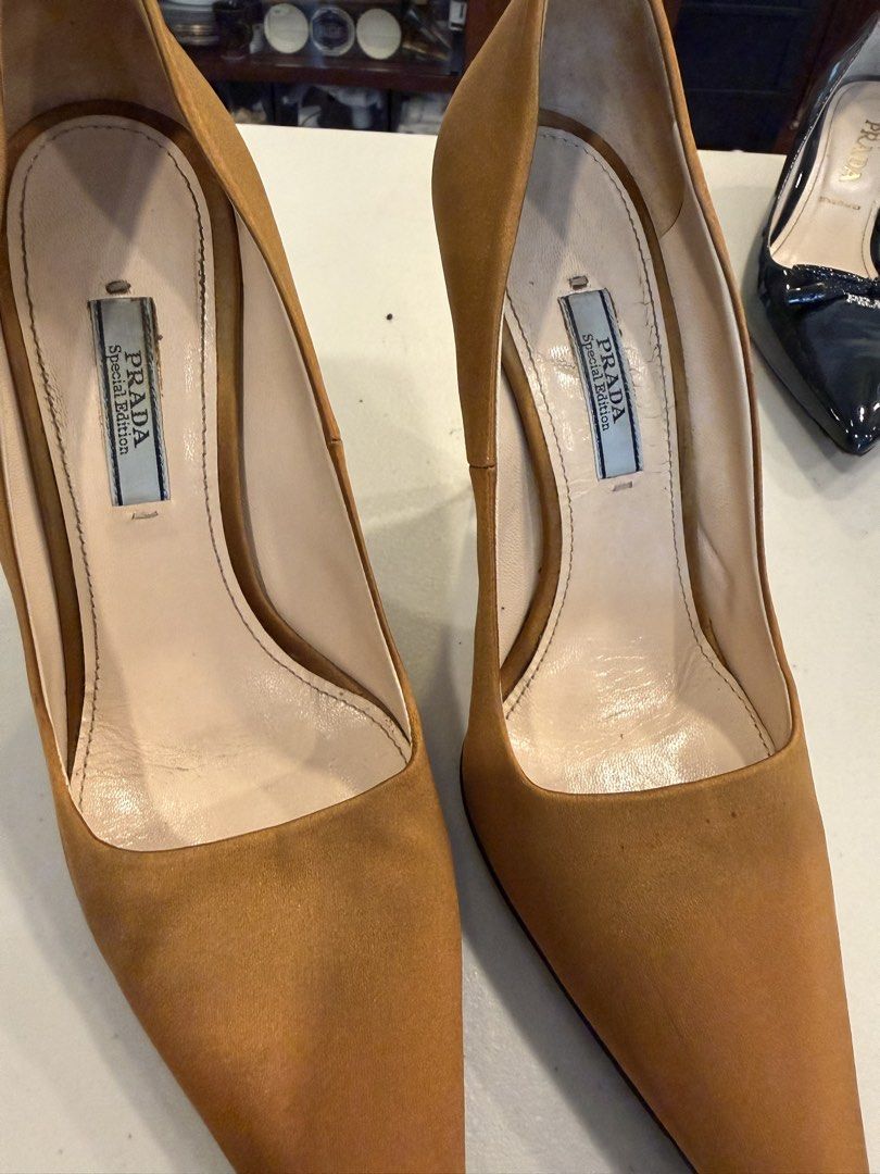 PRADA GOLDEN BROWN SATIN PUMPS ✨ (Category: Sneakers & Footwear) located in Pasig City. Submitted by marketplacesellinginc (Listing ID 1460991841, Image 3). Description: Selling my Prada pointed-toe satin pumps in a beautiful golden brown/mustard shade. Classic, elegant, and perfect for weddings, formal events, or dressing up an outfit. 🤎 👠 Brand: Prada 📏 Size: 37 IT 🎨 Color: Golden Brown / Mustard ✨ Material: Satin 🇮🇹 purchased in Italy, M
