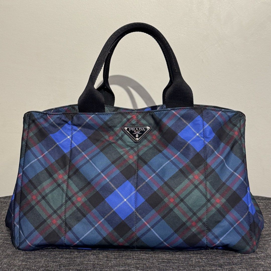 (FIXED PRICE) Prada Plaid Nylon Tessuto Canapa (Category: Luxury Bags & Wallets) located in Taguig. Submitted by quirkyfindsest2020 (Listing ID 1461090764, Image 1). Description: Comes with Card only. In Pristine Condition 9/10 💯 Guaranteed Authentic .