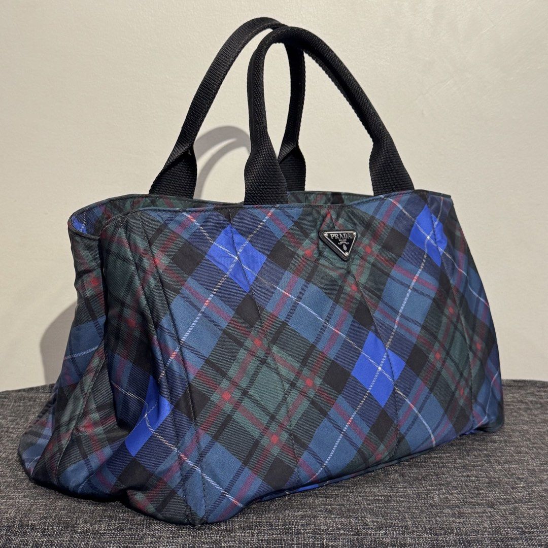 (FIXED PRICE) Prada Plaid Nylon Tessuto Canapa (Category: Luxury Bags & Wallets) located in Taguig. Submitted by quirkyfindsest2020 (Listing ID 1461090764, Image 2). Description: Comes with Card only. In Pristine Condition 9/10 💯 Guaranteed Authentic .