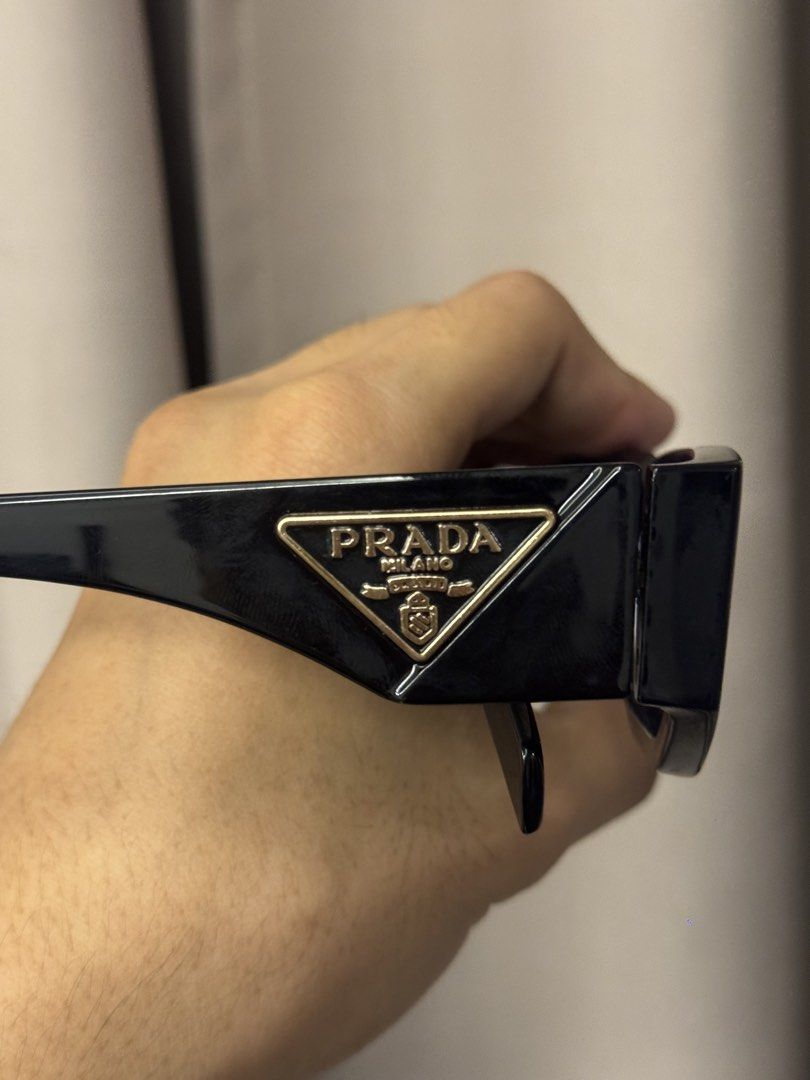 Prada PR09ZS (Category: Sunglasses & Eyewear) located in Quezon City. Submitted by drizzyarchives (Listing ID 1460959124, Image 2). Description: Pre loved Prada PR09ZS (unisex) No Issues Pristine condition Bought in Japan 🇯🇵 Buyer shoulders SF.