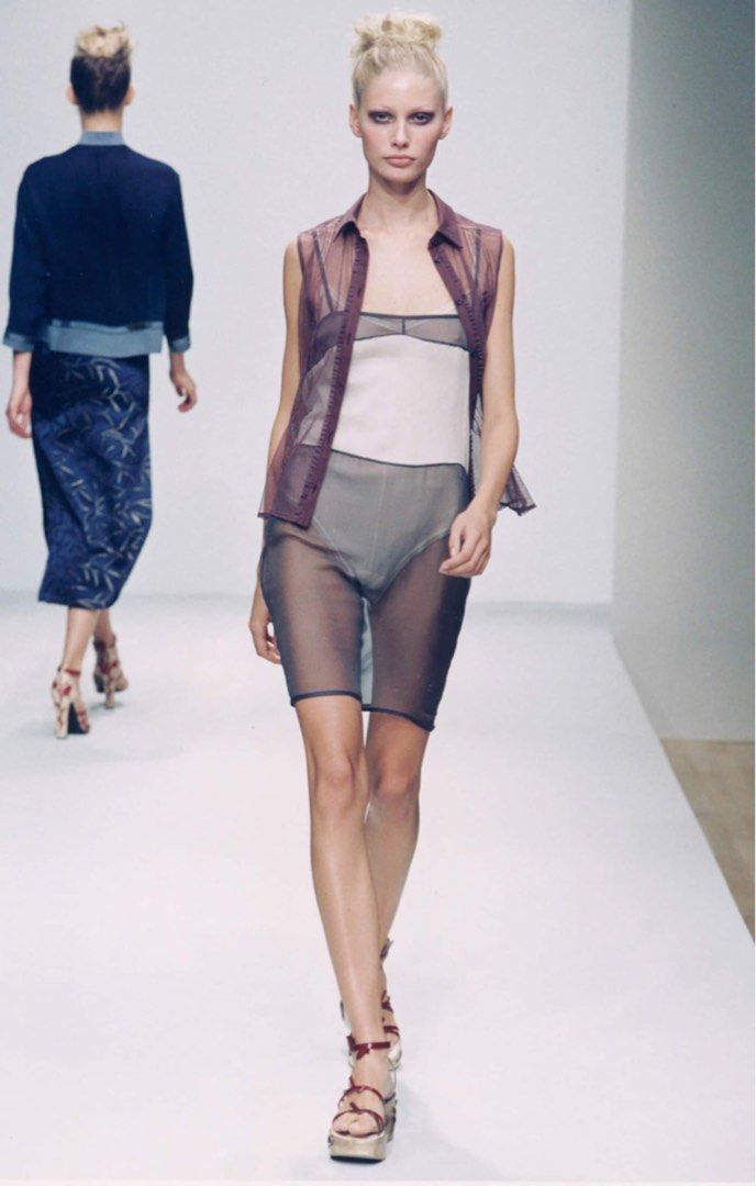 Prada Spring 1997 silk top (Category: Luxury Apparel) located in Quezon City. Submitted by raccoonfur (Listing ID 1460973570, Image 1). Description: Vintage Prada silk jersey sleeveless top. Utterly chic with its peak minimalist silhouette and slinky material. Has a stretch to it. Some subtle snags. Great condition nonetheless. Flat measurements: Pit to pit 39cm/15.25in Waist 36cm/14.15in Length 53.5cm/21in.