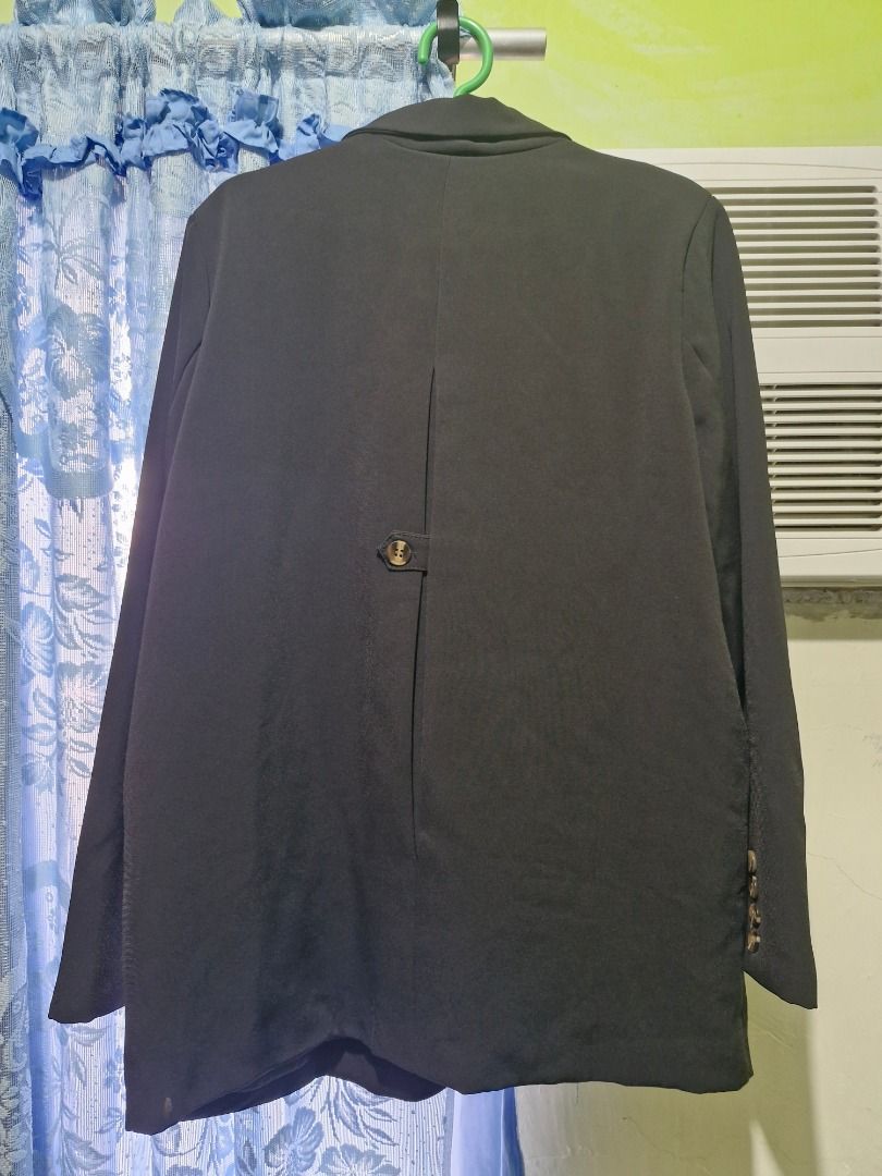 PRELOVED BLACK BLAZER FOR WOMEN (Category: Coats, Jackets and Outerwear) located in Caloocan City. Submitted by cmllesguerra (Listing ID 1461043830, Image 2). Description: RFS: Decluttering 📍 Location: Taytay, Rizal Payment first via bank transfer or GCash. - Brand: Suya - Color: Black - Closure: two button front - Pockets: Two flap pockets on front - Interior: Fully lined - Back detail: Button on vent - Style: Versatile for work or casual wear 