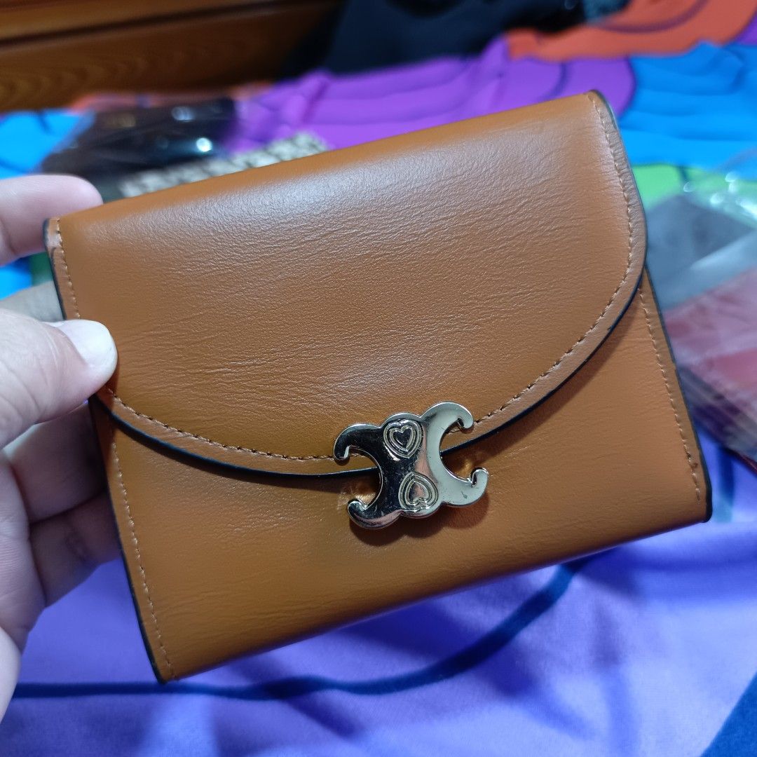 Preloved Brown Trifold Small Wallet Excellent Condition (Category: Wallets & Card holders) located in Binangonan. Submitted by messymeshyshop (Listing ID 1461092027, Image 2). Description: Overall condition: 9/10 Normal signs of use Loc: Binangonan, Rizal Mop: GCash only Shipping: FREE via Spx.