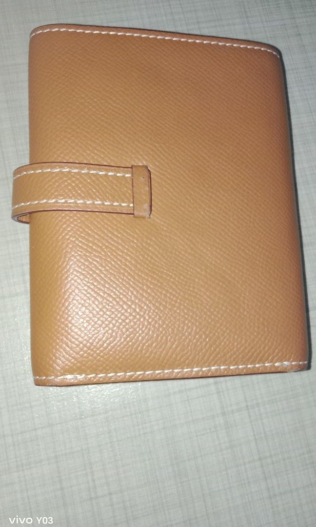 Preloved Hermes wallet (Category: Wallets & Card holders) located in Cabuyao City. Submitted by selections888 (Listing ID 1461082562, Image 3). Description: preloved from Japan supplier with code and made with paper bills slot ,coins and card slot. elegant design still in good condition for daily use.