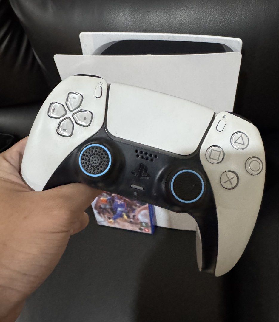 PS5 Phat 825 gb with 1 controller and NBA 2k26 (Category: PlayStation) located in Pasig City. Submitted by robbiseraphin (Listing ID 1460967446, Image 2). Description: 🎮 Selling: PS5 Phat 825gb Disc version + 1 controller and NBA 2k26 ✅ Inclusives: - PS5 Phat 825gb (never been opened or repaired) - latest firmware - 1 dualsense controller (no rubber sa analog. May linagay ako na cover. Works with no issues) - NBA 2k26 CD - complete wires (HDMI a