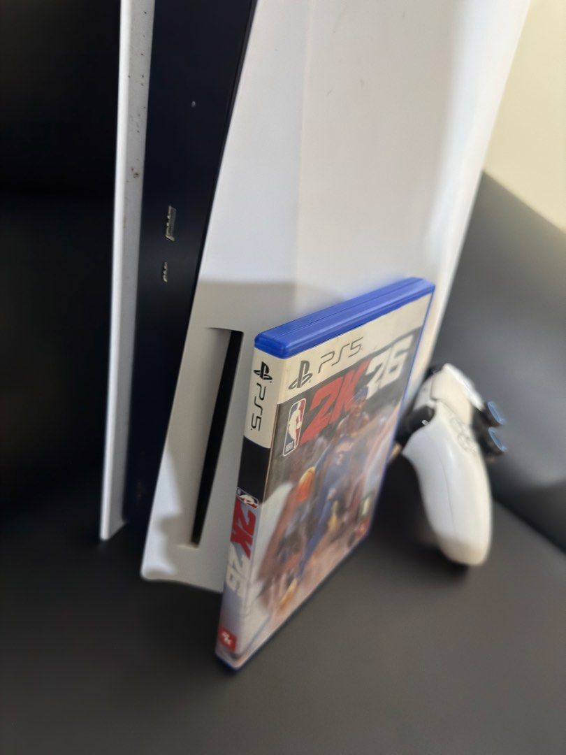 PS5 Phat 825 gb with 1 controller and NBA 2k26 (Category: PlayStation) located in Pasig City. Submitted by robbiseraphin (Listing ID 1460967446, Image 3). Description: 🎮 Selling: PS5 Phat 825gb Disc version + 1 controller and NBA 2k26 ✅ Inclusives: - PS5 Phat 825gb (never been opened or repaired) - latest firmware - 1 dualsense controller (no rubber sa analog. May linagay ako na cover. Works with no issues) - NBA 2k26 CD - complete wires (HDMI a