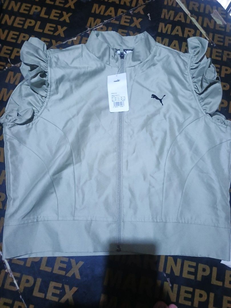 Puma Women's Ruffled Sleeve Jacket (Category: Coats, Jackets and Outerwear) located in Manila. Submitted by jajahail2025 (Listing ID 1461108835, Image 1). Description: - Lightweight Puma jacket - Features cute ruffled sleeves - Full zip front closure - Stand-up collar for a sleek look - Black Puma logo on the chest - Perfect for layering or as a light outer layer - Great for workouts or casual wear.