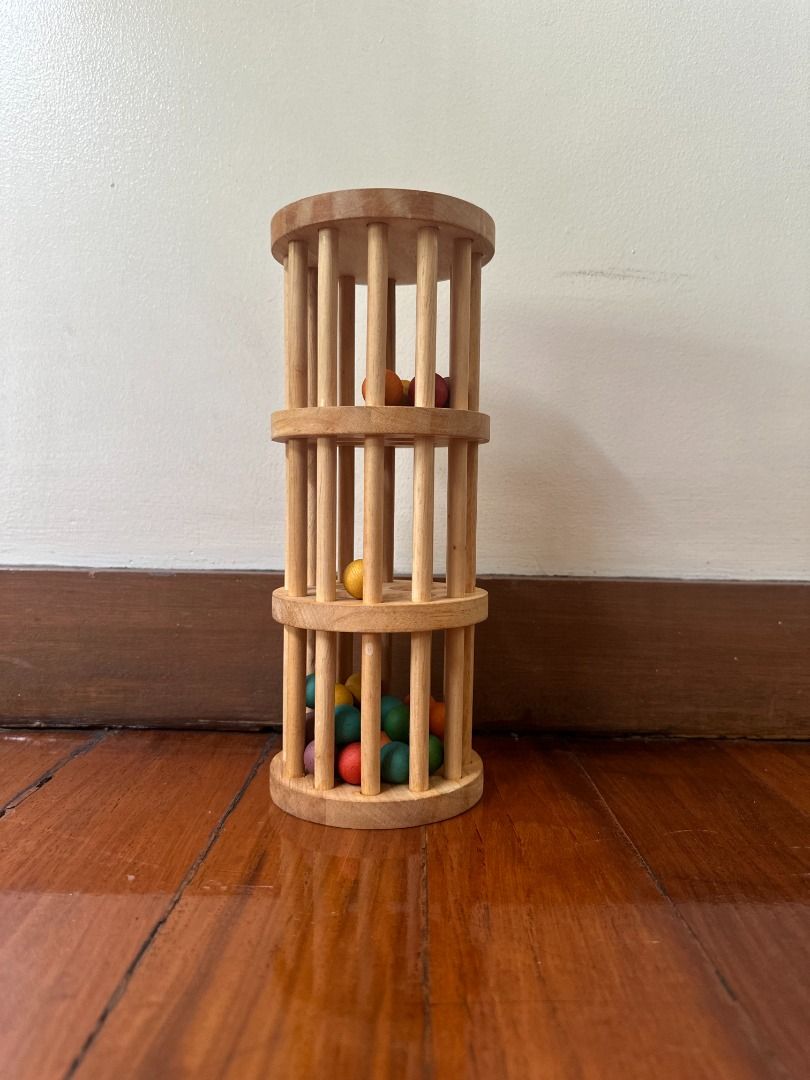 Q-Toys Wooden Rainmaker (Category: Infant Playtime) located in Makati City. Submitted by travelfinds34611 (Listing ID 1460928012, Image 1). Description: GREAT CONDITION. Qtoys Wooden Rainmaker From: Australia - Features colorful beads that make noise when rolled - Ideal for sensory play and developing motor skills - Made from durable wood - Great for young children's exploration.