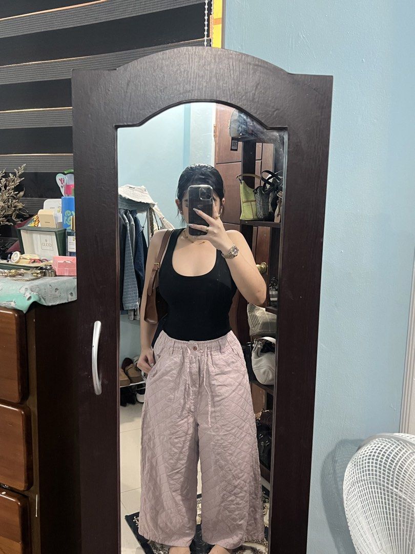 Quilted Wide Leg Pants - Pink (Category: Other Bottoms) located in Abucay. Submitted by pmuffy24 (Listing ID 1461103771, Image 2). Description: - Super comfy quilted wide leg pants - Soft pastel pink color - Elastic waistband with adjustable drawstring - Convenient side pockets - Versatile for lounging or casual outings - Fits most sizes due to elastic waist.