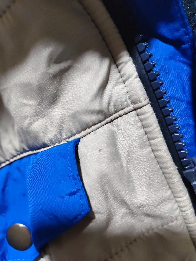 Ralph Lauren Lightweight Puffer Jacket with Black Sleeves (Category: Coats, Jackets and Outerwear) located in Manila. Submitted by bsemcfran19535 (Listing ID 1460982196, Image 2). Description: - check photos for super duper small stains - Light grey body with black sleeves - Full zip front closure - Small blue chest pocket - Ideal for layering or standalone wear - Comfortable and practical for daily use.