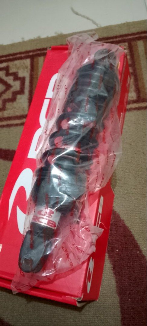 RCB Motorcycle Shock Absorber Black (Category: Other Motorcycles Parts and Accessories) located in Manila. Submitted by dang8413 (Listing ID 1461111804, Image 3). Description: - Brand: RCB Shock Absorber - Color: Black Coil Spring - Condition: Comes in original box - Use: Ideal for motorcycle upgrades or replacements - Details: Please check photos for condition and specifics - Availability: Ready for shipping.