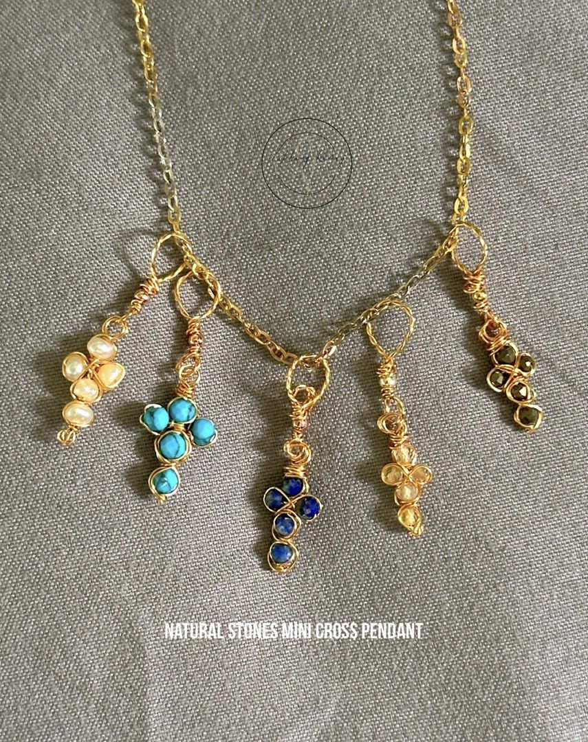 Real natural stones handmade mini cross pendant (Category: Necklaces) located in Muntinlupa City. Submitted by alabangbargains (Listing ID 1460989376, Image 1). Description: watch item video here: https://youtube.com/shorts/oFBNdo0380Q?si=8aBjGZBwenWJ9l9D Material:natural stones and pearl in 2-3mm size, fadeless kc gold color wire Handmade own design ‼️We customize for different stone preference depending on stone availability lightweight comfy t