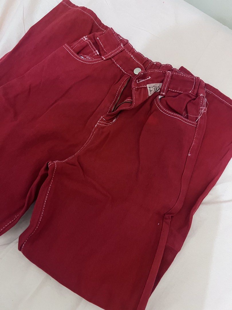 Red Pants with White Stitching (Category: Other Bottoms) located in Manila. Submitted by coles.collection (Listing ID 1461065952, Image 2). Description: - free if makaka 2 pcs up na purchase ng pants - size; •w - 24-25 •l - 39 •r - 12.