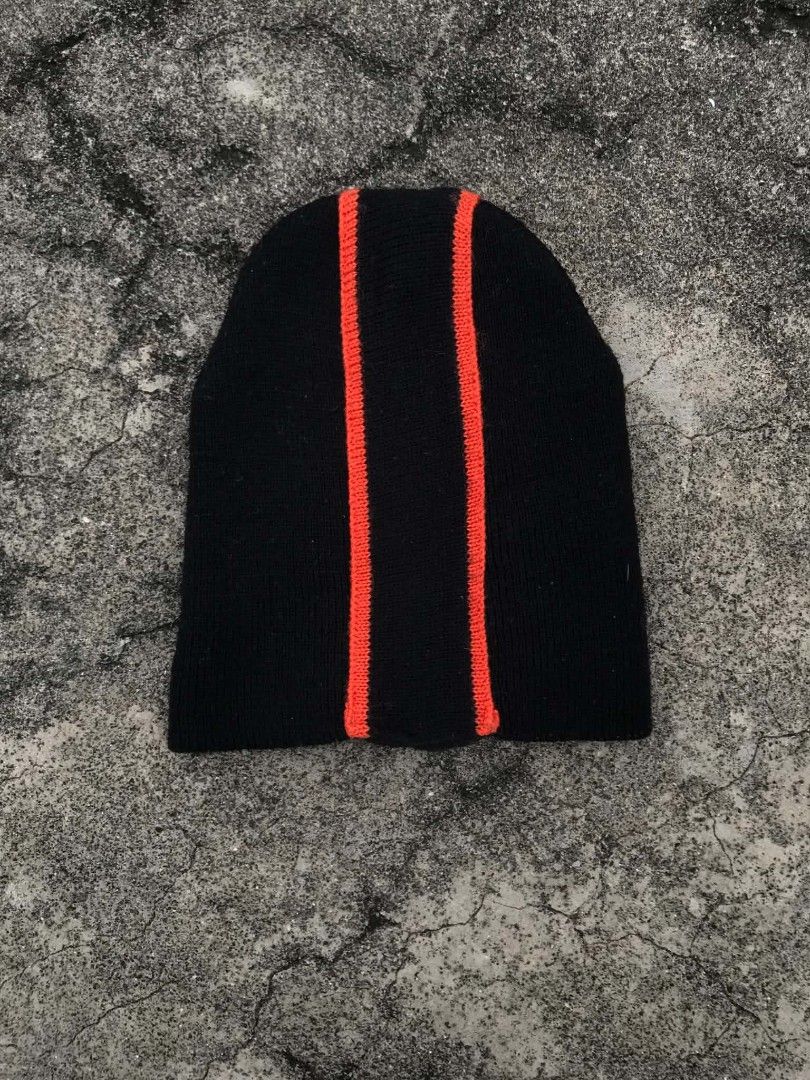 Reebok Black Beanie with Red Stripes (Category: Caps & Hats) located in Davao. Submitted by waloohpuf (Listing ID 1460925159, Image 3). Description: - Classic black Reebok beanie - Features two bold red stripes on the front - Embroidered Reebok vector logo on the side - Made from comfortable knit material - Ideal for staying warm in cooler weather - Simple and stylish design.