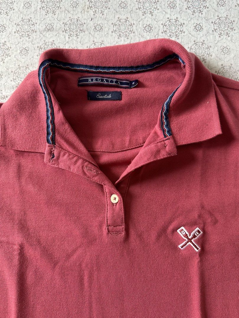 Regatta Essentials Red Polo Shirt (Category: Shirts) located in Quezon City. Submitted by 4k_cam (Listing ID 1460964047, Image 2). Description: - Regatta Essentials polo shirt - Vibrant red color - Embroidered Regatta logo on chest - Striped detail on collar - Button closure at the neck - Ideal for casual everyday wear.