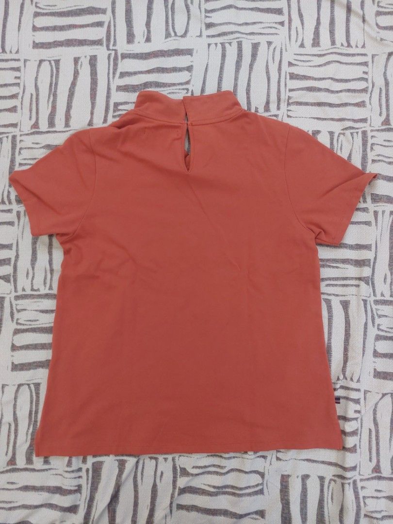 Regatta Orange Polo Shirt Size L (Category: Tshirts & Polo Shirts ) located in Malaybalay. Submitted by mags_sofia (Listing ID 1461016013, Image 3). Description: - Brand: Regatta - Color: Orange - Size: L - Style: Short sleeve polo shirt - Features: Collared, button closure at neck - Ideal for: Everyday wear, casual outings - marking by the side due to dust and long storage.