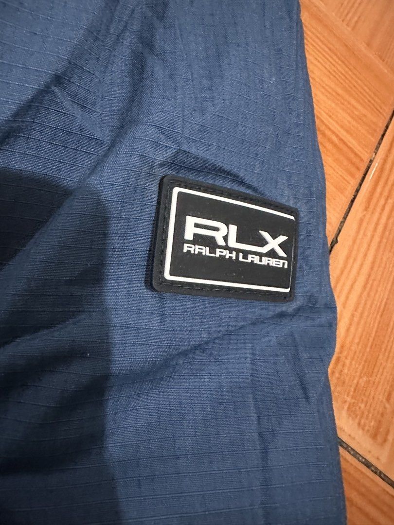 RLX Ralph Lauren Outerwear Jacket (Category: Coats, Jackets and Outerwear) located in Bulacan. Submitted by adoseofluxxee (Listing ID 1460936170, Image 3). Description: - RLX Ralph Lauren outerwear jacket - Two-tone blue design - Two chest pockets - Two side pockets - Button closure - Size M.
