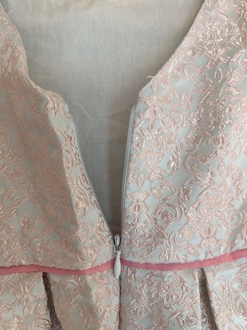 Robby Rabbit Classic Collection Size 4 Dress (Category: Babies & Kids Fashion) located in Taguig. Submitted by _annaq_ (Listing ID 1460769707, Image 3). Description: - Robby Rabbit Classic Collection dress, size 4 - Lovely pink and white brocade pattern - Thin pink ribbon detail at the waist - Perfect for parties and special occasions For everyone’s fairness and transparency, kindly read Seller's Policy first before making an offer. 😊 1. Please 