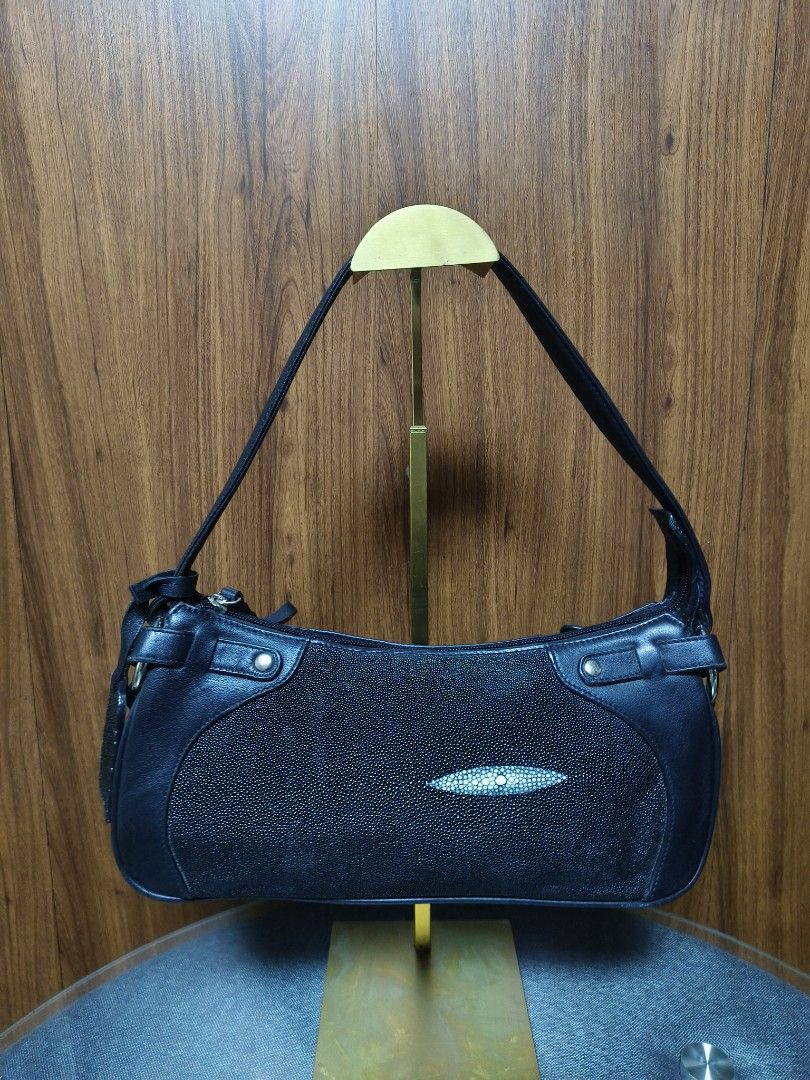 ROBERT DUE STINGRAY BAGUETTE BAG (Category: Shoulder Bags) located in Baguio. Submitted by PreiLoveMaria (Listing ID 1461050799, Image 3). Description: ROBERT DUE STINGRAY BAGUETTE BAG elegant black shoulder bag by Roberto Due Classic, featuring smooth leather trim combined with textured shagreen (stingray) leather panels and its distinctive central pearl-like eye/cluster detail on the front. It has a structured silhouette, a comfortable single s