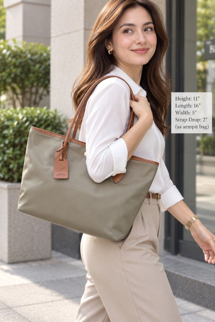 ROBERTA PIERI NYLON TOTE BAG (Category: Tote Bags) located in Las Pinas. Submitted by annachiaonair2037 (Listing ID 1460941396, Image 1). Description: ROBERTA PIERI NYLON TOTE FROM JAPAN MADE IN ITALY MAGNETIC SNAP CLOSURE UNUSED HANDLE DROP 9" NYLON WITH LEATHER HANDLES H 11" L 16.5" W 5.5" Disclaimer: I am not affiliated with, associated with, or authorized by any of the brands featured posted. Any mention of brand names, trademarks, or logos i