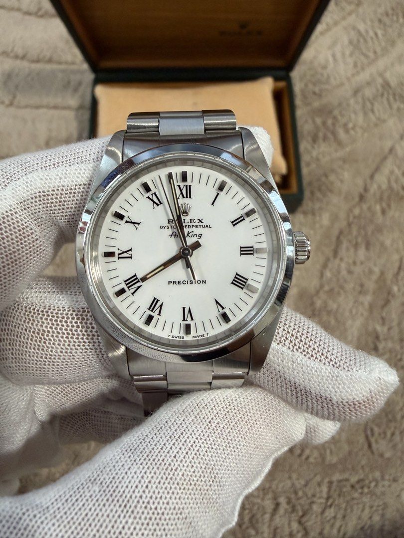 Rolex Airking (Category: Luxury Watches) located in Santa Rosa. Submitted by fourthhourtimepieces (Listing ID 1460956653, Image 3). Description: ROLEX AIR-KING PRECISION 🤍 A timeless vintage Rolex featuring a clean white Roman numeral dial, stainless-steel case, and classic Oyster bracelet. • Year 1996 • 34mm • Automatic movement • Watch with Rolex box • Good overall condition • Authentication welcome Asking Price: ₱275,000 Meet-up: Alabang Ship